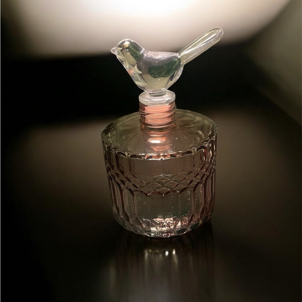 Elegant Glass Bird-Top Perfume Bottle.